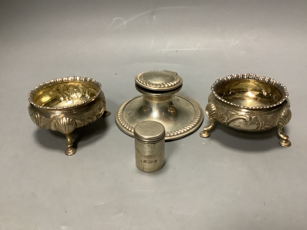 One 18th century silver salt and one Victorian silver salt, a silver inkwell and a cylindrical sterling vesta case.